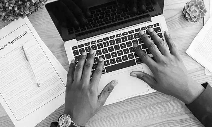 Copywriter crafting compelling website text for a Ghanaian brand