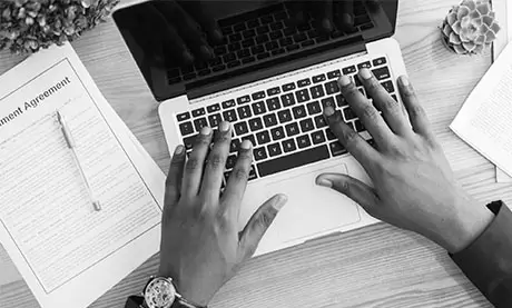 Copywriter crafting compelling website text for a Ghanaian brand