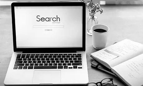 Accra business owner viewing improved website traffic from SEO